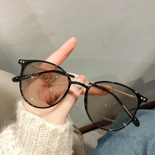 Vintage Round Photochromatic Myopia Glasses | Blue Light Blocking & UV400 Sunglasses.